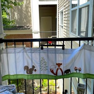 53" green and white woodland creatures valance in good condition